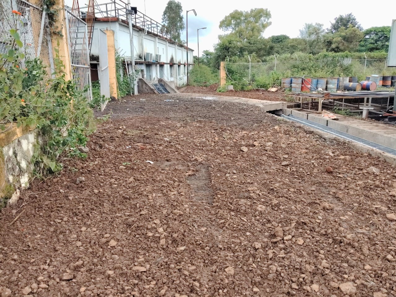 Ground preparation beside the site building